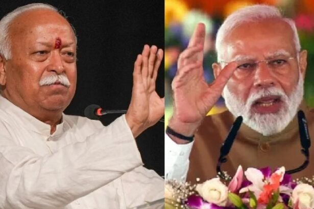 प्रधानमंत्री नरेंद्र मोदी और राष्ट्रीय स्वयंसेवक संघ के सरकार्यवाह दत्तात्रेय होसबाले शताब्दी समारोह में भारत माता की तस्वीर वाले ₹100 के सिक्के और डाक टिकट का अनावरण करते हुए।