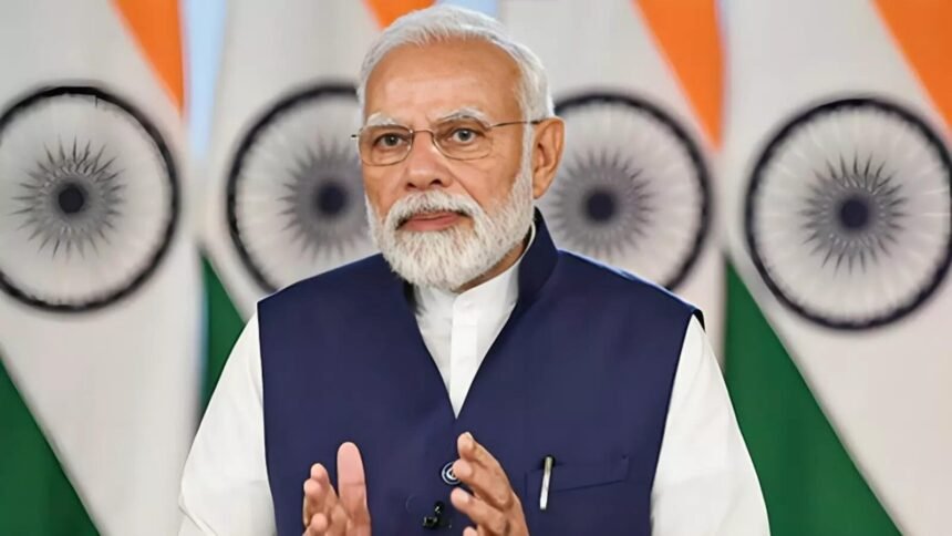 प्रधानमंत्री नरेंद्र मोदी इंदिरा गांधी इंडोर स्टेडियम में वंदे मातरम् 150 वर्ष समारोह का उद्घाटन करते हुए।