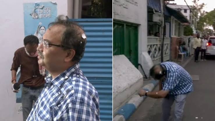 कोलकाता में ममता बनर्जी आवास के पास TMC विधायक कुणाल घोष पर अंडा फेंकते हुए युवक और मौके पर मौजूद सुरक्षाकर्मी, अफरातफरी का माहौल